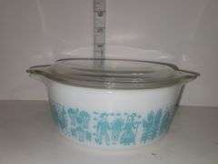 Vintage PYREX Amish "Butterprint" white with turquoise casserole dish with a lid.