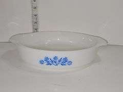Vintage Anchor Hocking Fire King casserole dish with a blue cornflower pattern.