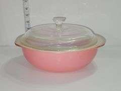 Vintage PYREX Flamingo Pink 024 casserole dish with a lid.