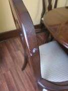 Table, 3 leaves. Includes 1 capatins chair & 5 dining chairs