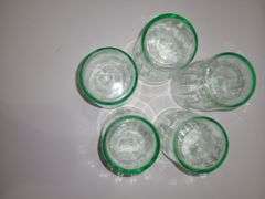 Green depression glass juice glasses. (Uranium Glasses)