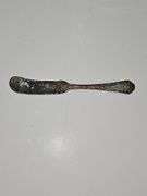 Silver colored cup and flatware