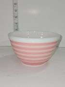 Vintage PYREX "Rainbow Stripes" mixing bowl in pink.
