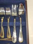 Stainless Steel flatware in wooden storage box