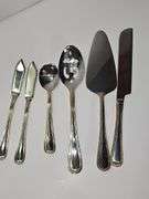 Stainless Steel flatware in wooden storage box