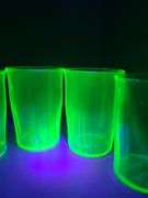 Green depression glass juice glasses. (Uranium Glasses)