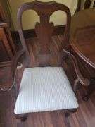 Table, 3 leaves. Includes 1 capatins chair & 5 dining chairs