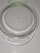 Vintage PYREX casserole dish in the "Forest Fancies" pattern.