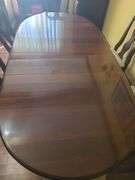 Table, 3 leaves. Includes 1 capatins chair & 5 dining chairs