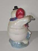 Coca-Cola Snowman using a bottle opener cookie jar.