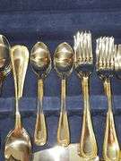 Stainless Steel flatware in wooden storage box