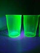 Green depression glass juice glasses. (Uranium Glasses)