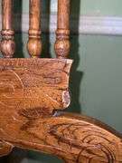 Vintage solid wood swivel bar stool.