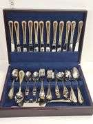 Stainless Steel flatware in wooden storage box