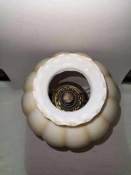 Vintage brass hurricane lamp with milk glass shade