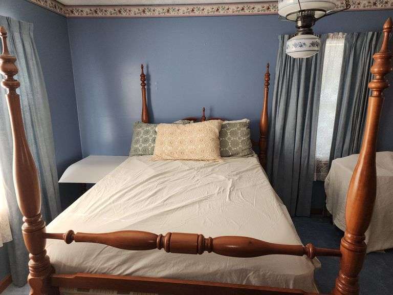 Wooden four-poster full size bed & bedding