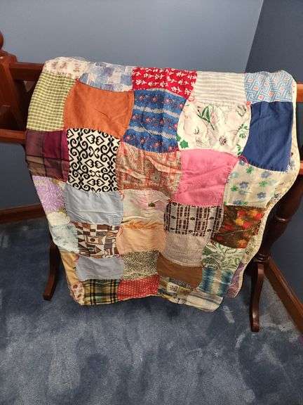 Handmade multicolored quilt & cherry quilt stand