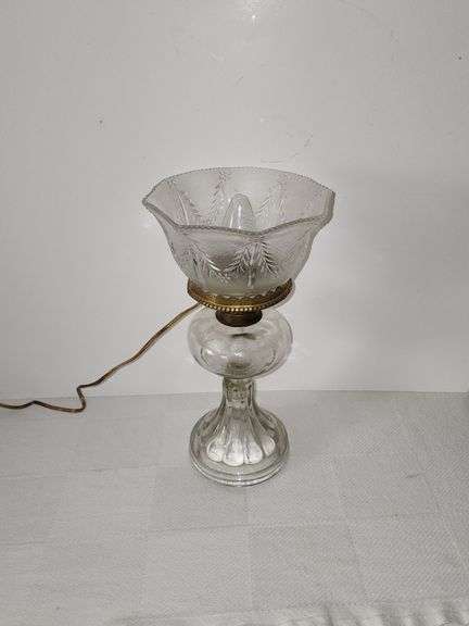 Clear glass oil lamp with electric
