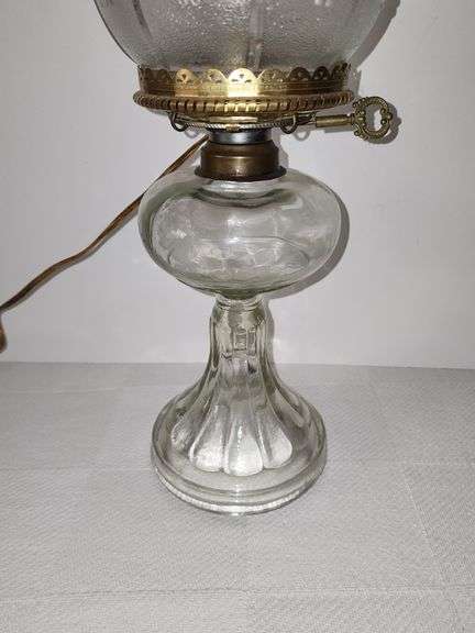 Clear glass oil lamp with electric