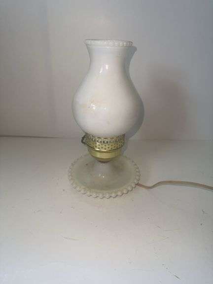 Vintage milk glass table lamp with a ruffled base