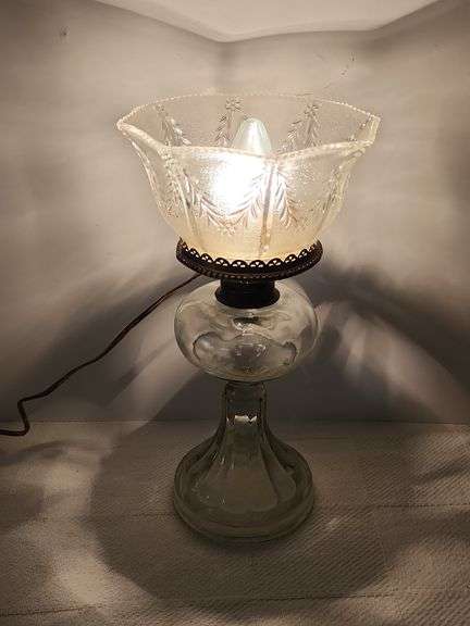 Clear glass oil lamp with electric