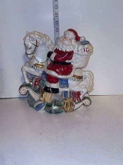 Santa on rocking horse - made in China