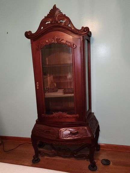 Carved orie tal style curio or china display cabinet.