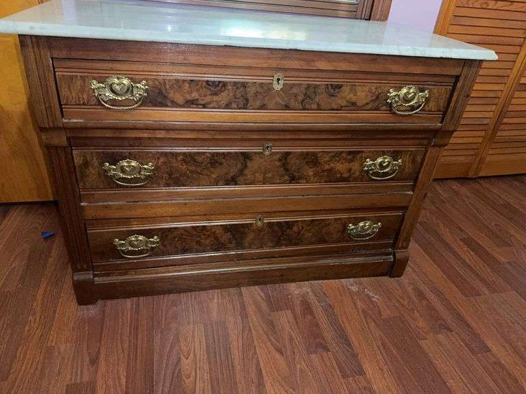 Victorian walnut dresser with a marble top and mirror