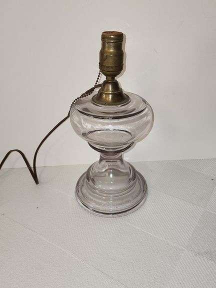 Clear glass oil lamp converted to electric