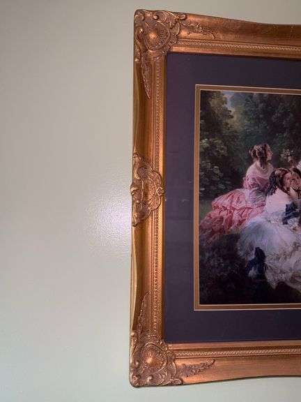 Ladies print in gold colored frame