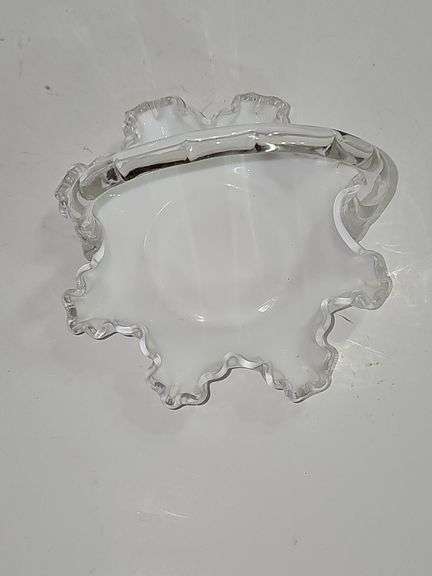 Vintage Fenton Silver Crest ruffled milk glass basket with a clear handle