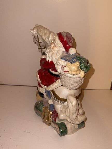Santa on rocking horse - made in China