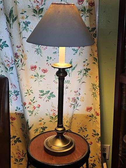 Empire-style brass and ebonized candlestick buffet lamp.