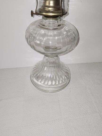 Clear glass oil lamp with fluted or ribbed pattern base & clear glass chimney
