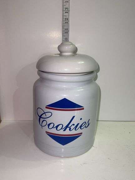 Vintage white ceramic cookie jar .