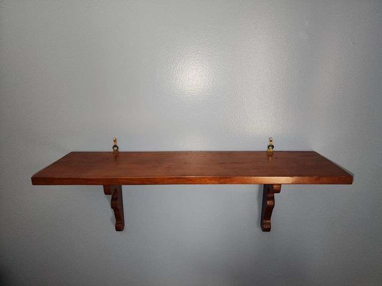 Framed print of Jesus, musical figurine, praying hands, & shelf.