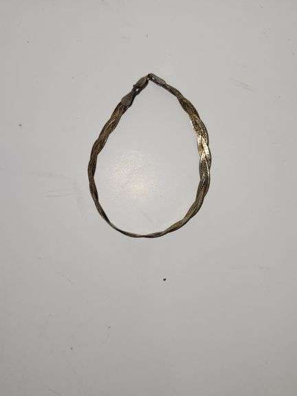 Sterling silver herringbone chain bracelet.