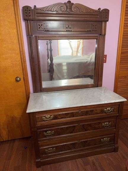 Victorian walnut dresser with a marble top and mirror