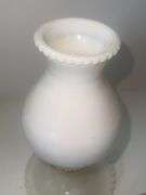 Vintage milk glass table lamp with a ruffled base