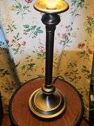 Empire-style brass and ebonized candlestick buffet lamp.