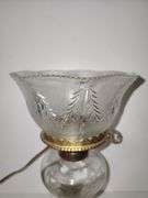 Clear glass oil lamp with electric