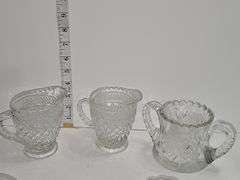 Clear glass creamer & other various glass pieces