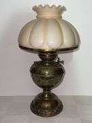 Vintage brass hurricane lamp with milk glass shade