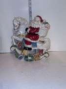 Santa on rocking horse - made in China