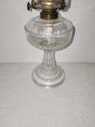 Clear glass "Dogtooth" pattern" oil lamp with tall clear chimney