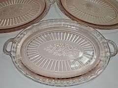 Vintage pink depression glass oval serving platter.