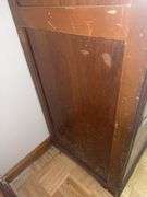 Wooden armoire with a mirrored door