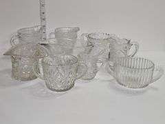 Clear glass creamer & other various glass pieces