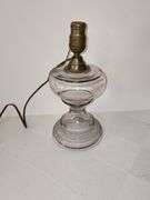 Clear glass oil lamp converted to electric