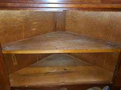 Colonial-style corner hutch or cupboard